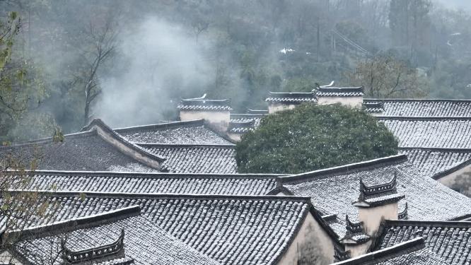 航拍江南徽派古建筑的冬天 雪后马头墙屋檐屋面炊烟