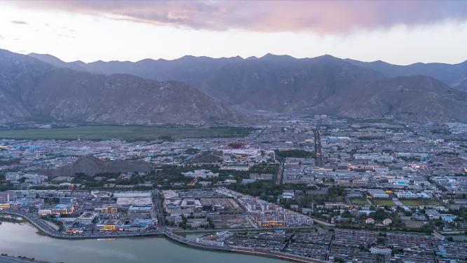 西藏拉萨市城市风景日落夜景延时