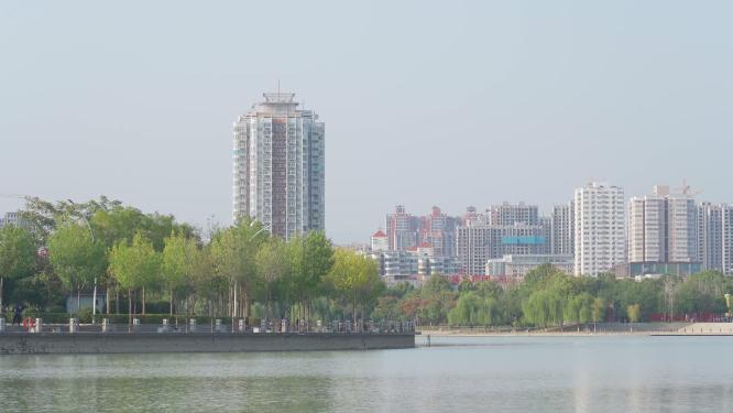 阳光湖泊高楼建筑