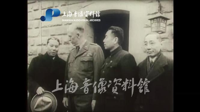 1946年周恩来和国民党代表张群签订停战协定