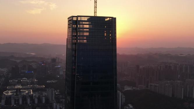 航拍城市高楼吊塔日落